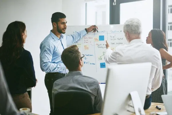 group of business colleagues meeting in an office